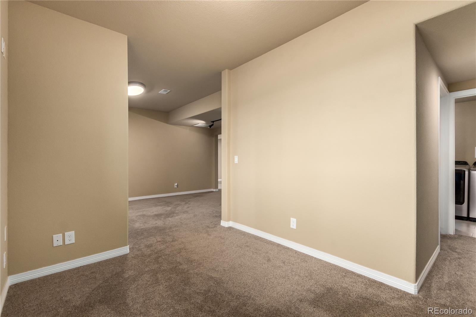 24389 East Brandt Avenue Aurora, CO 80016 - Photo 27 of 49 a view of an empty room