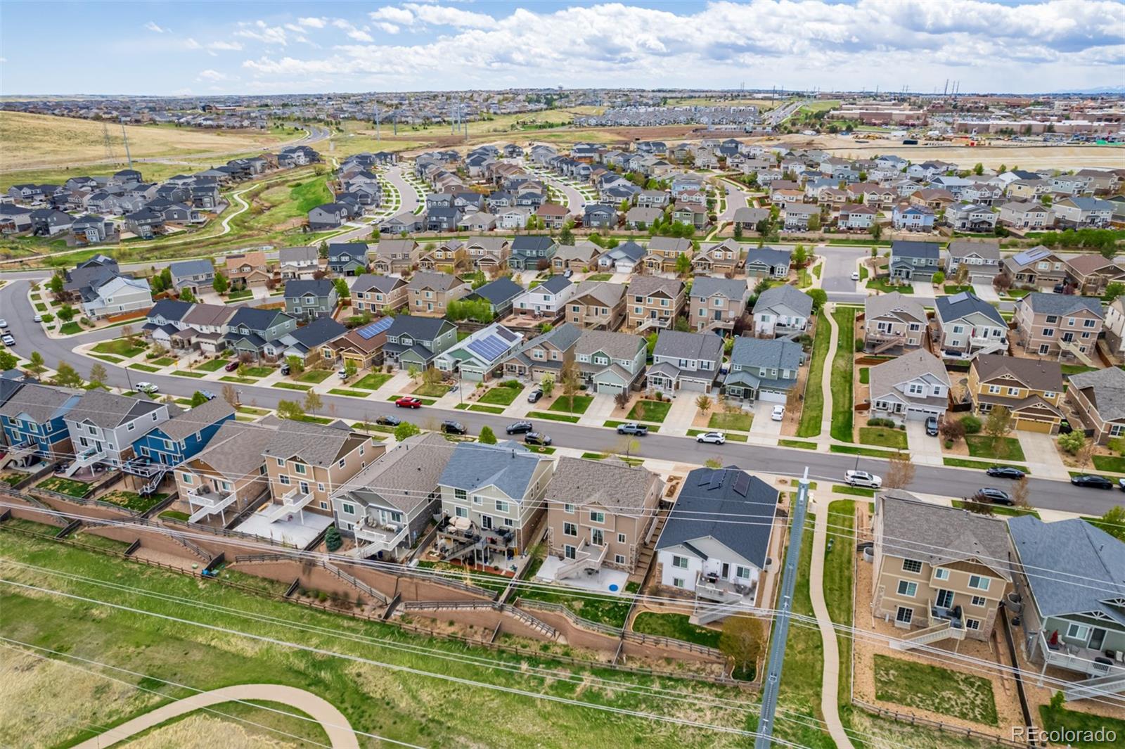 24389 East Brandt Avenue Aurora, CO 80016 - Photo 47 of 49 an aerial view of residential houses with outdoor space