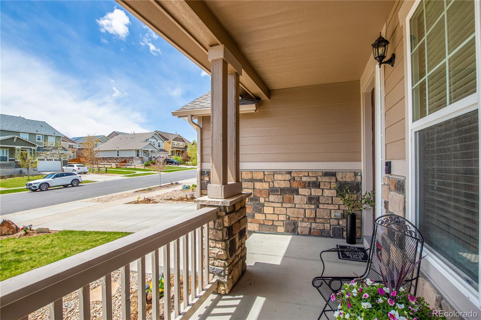 24389 East Brandt Avenue Aurora, CO 80016 - Photo 5 of 49 a city view from a balcony with patio
