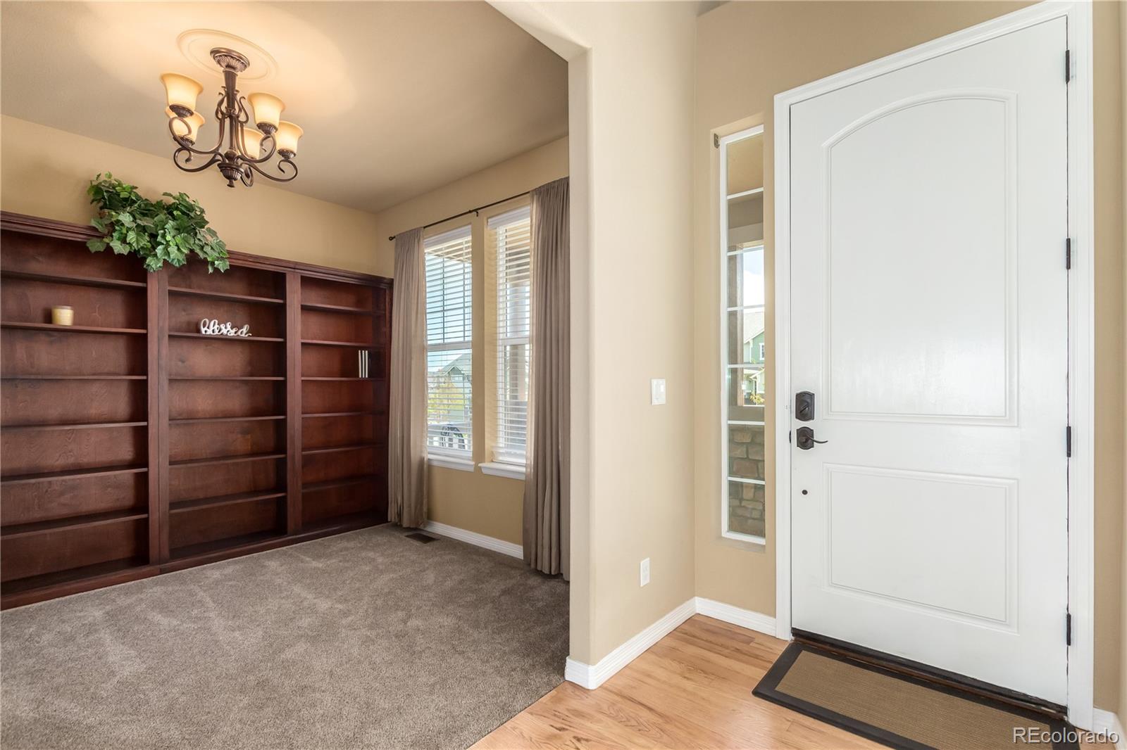 24389 East Brandt Avenue Aurora, CO 80016 - Photo 6 of 49 an empty room with a empty space