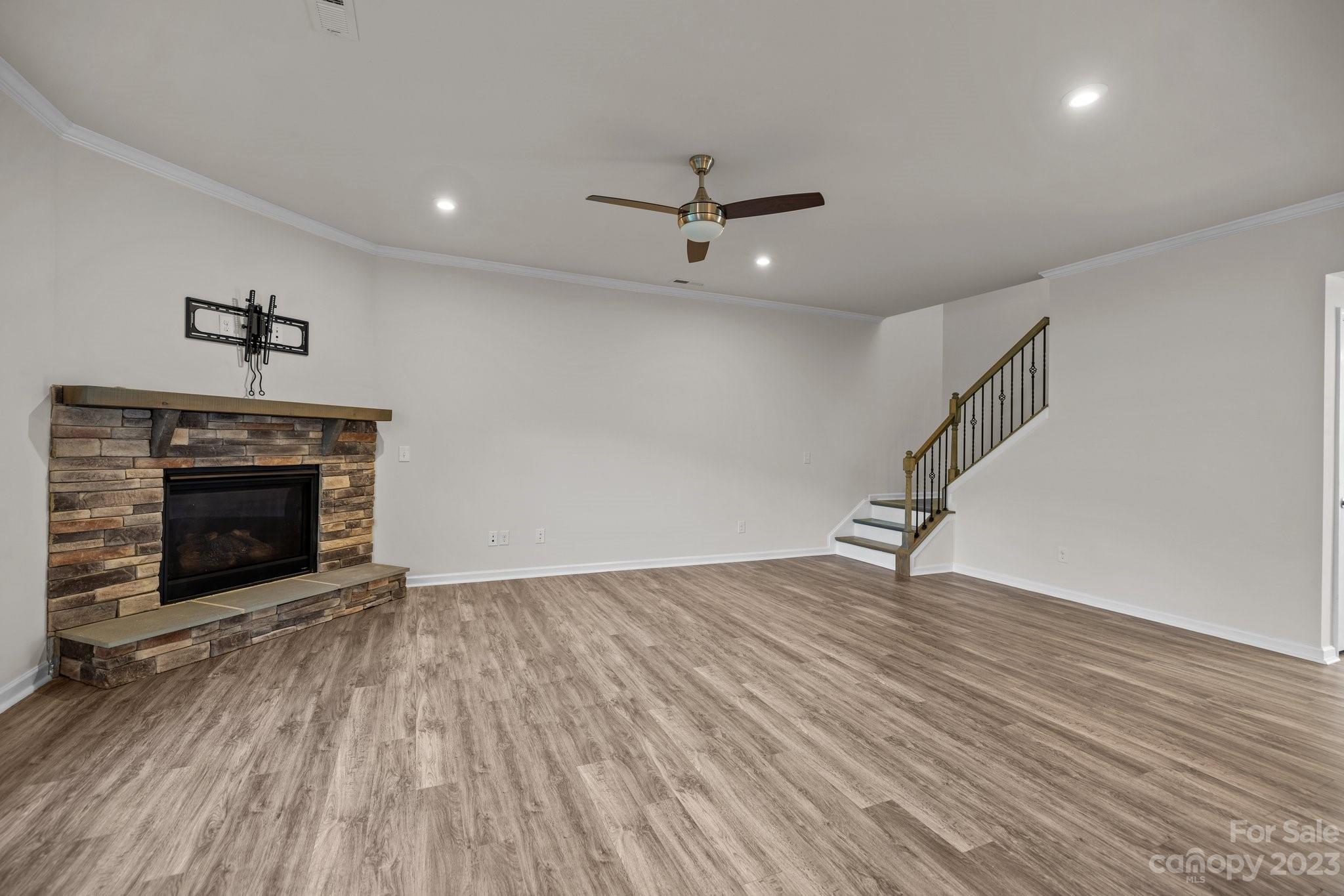 137 Hampton Trail Drive Fort Mill, SC 29708 - Photo 14 of 48 an empty room with windows and fireplace