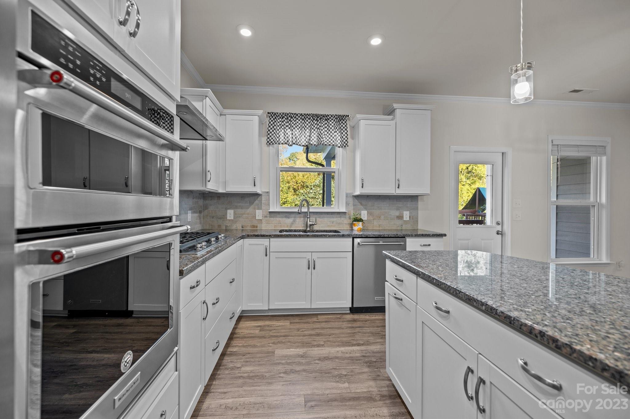 137 Hampton Trail Drive Fort Mill, SC 29708 - Photo 20 of 48 a kitchen with stainless steel appliances granite countertop a stove and a sink