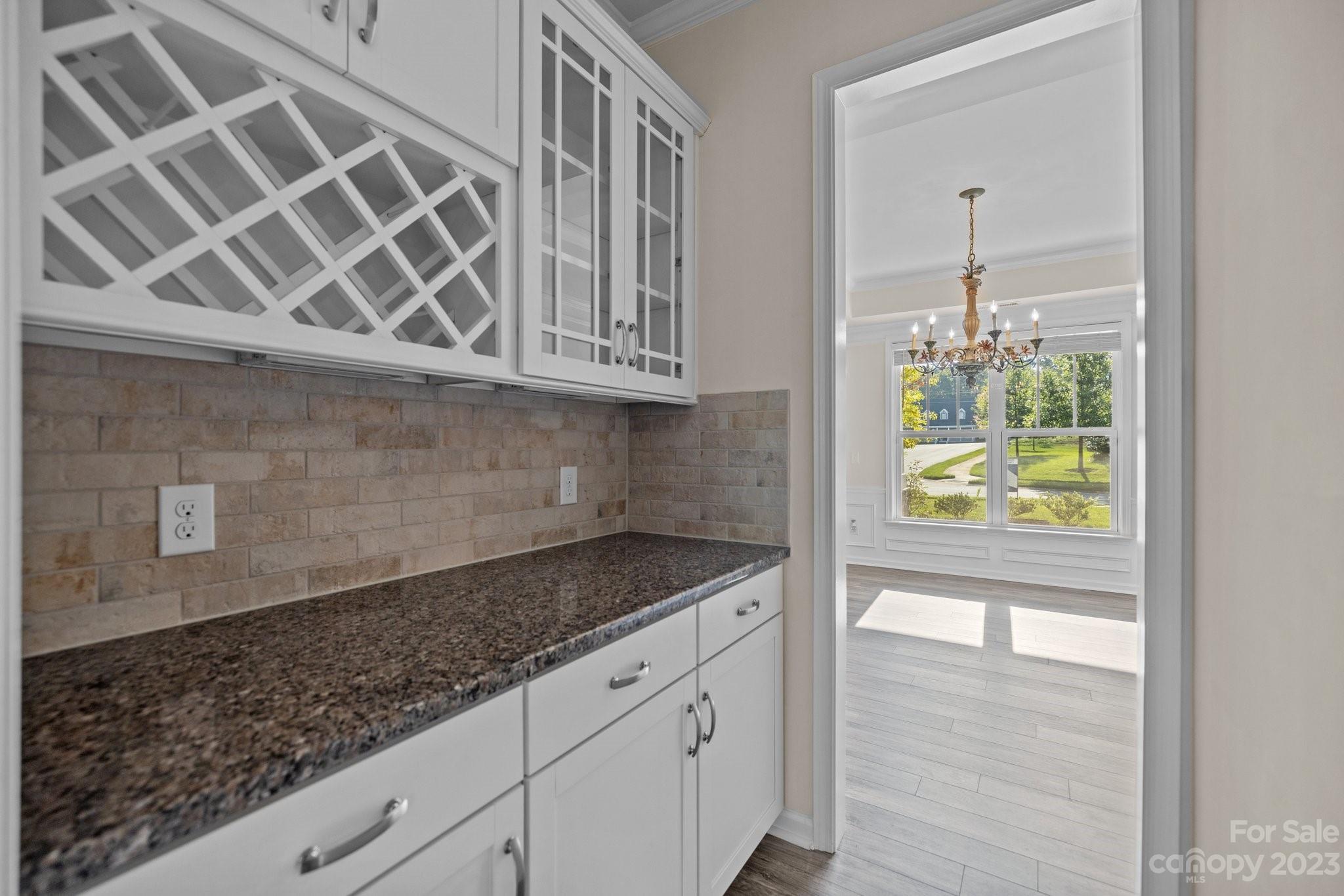 137 Hampton Trail Drive Fort Mill, SC 29708 - Photo 22 of 48 a kitchen with granite countertop a oven and a white countertops
