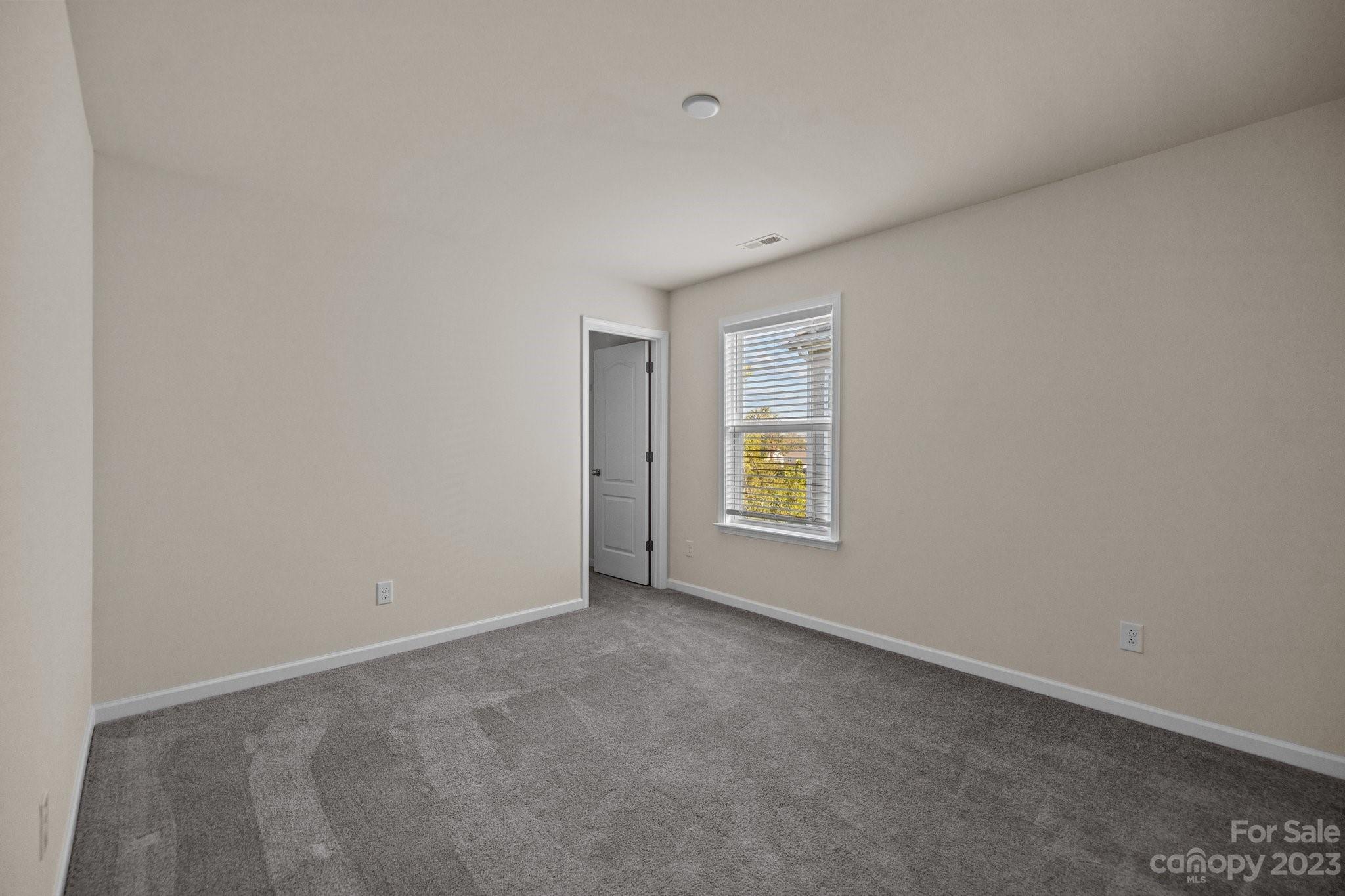 137 Hampton Trail Drive Fort Mill, SC 29708 - Photo 26 of 48 an empty room with windows
