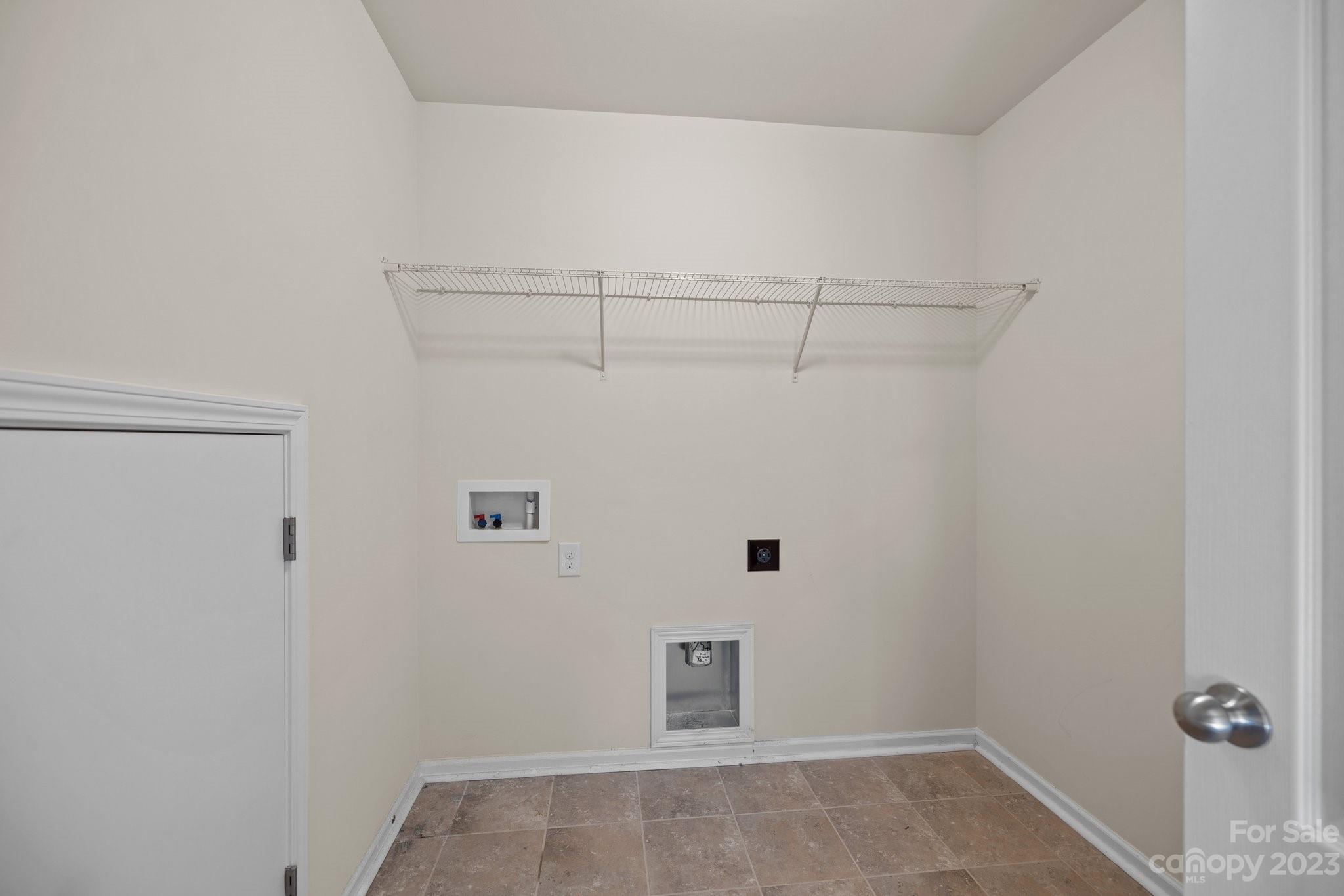 137 Hampton Trail Drive Fort Mill, SC 29708 - Photo 31 of 48 a view of a room with shelf on the wall