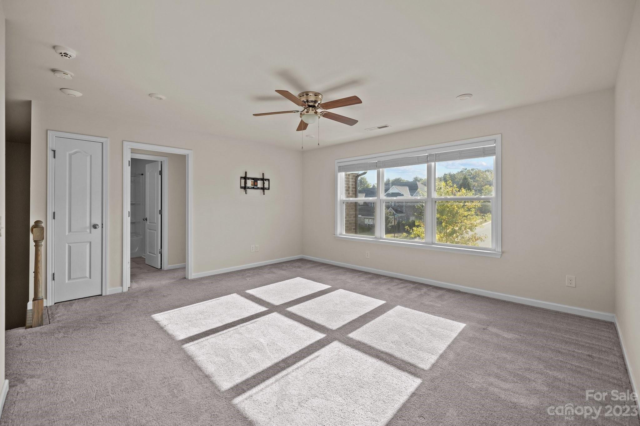 137 Hampton Trail Drive Fort Mill, SC 29708 - Photo 37 of 48 wooden floor in an empty room with a window