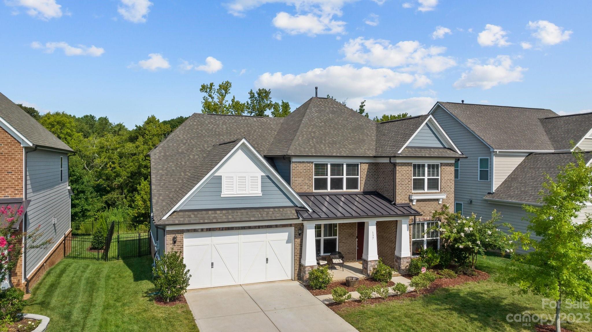 137 Hampton Trail Drive Fort Mill, SC 29708 - Photo 43 of 48 a aerial view of a house with a yard and potted plants