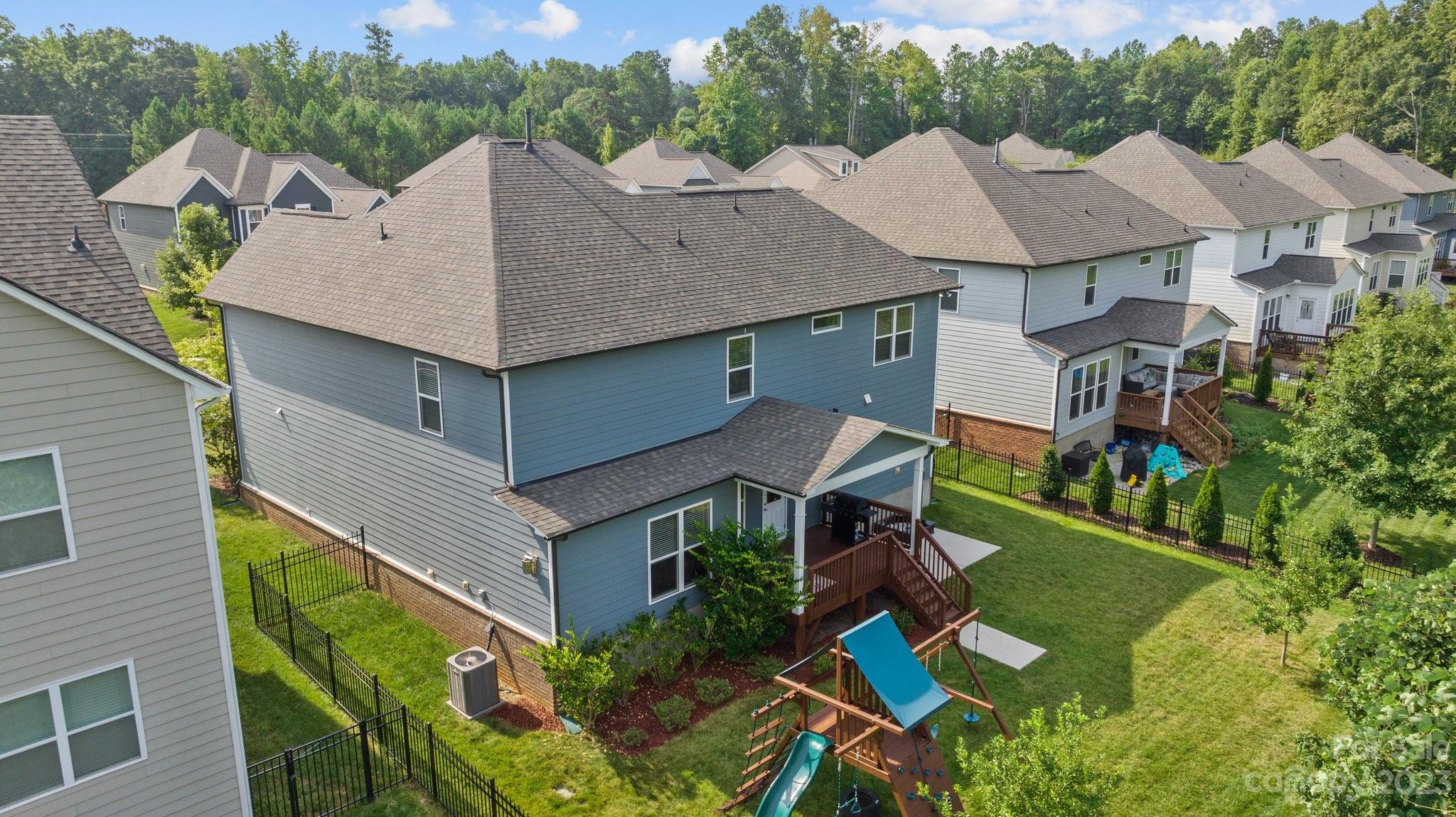 137 Hampton Trail Drive Fort Mill, SC 29708 - Photo 45 of 48 a aerial view of a house with swimming pool and garden