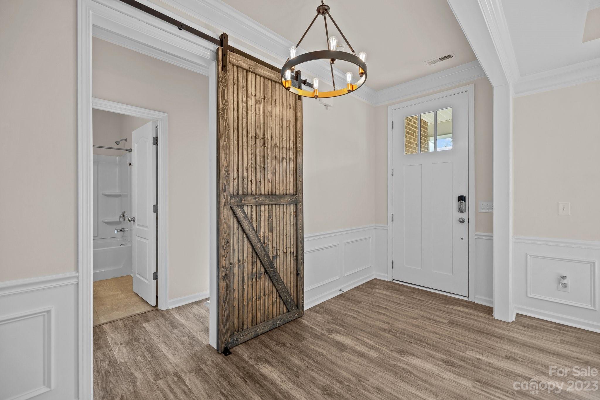 137 Hampton Trail Drive Fort Mill, SC 29708 - Photo 5 of 48 a view of a hallway with wooden floor and entryway