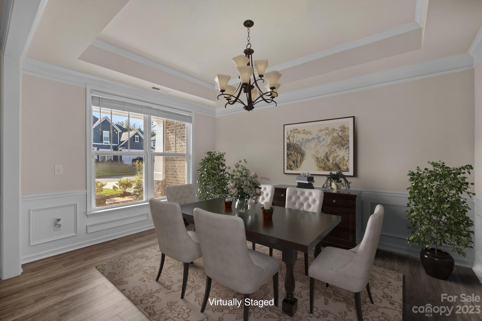 137 Hampton Trail Drive Fort Mill, SC 29708 - Photo 6 of 48 a dining room with furniture a rug and a chandelier