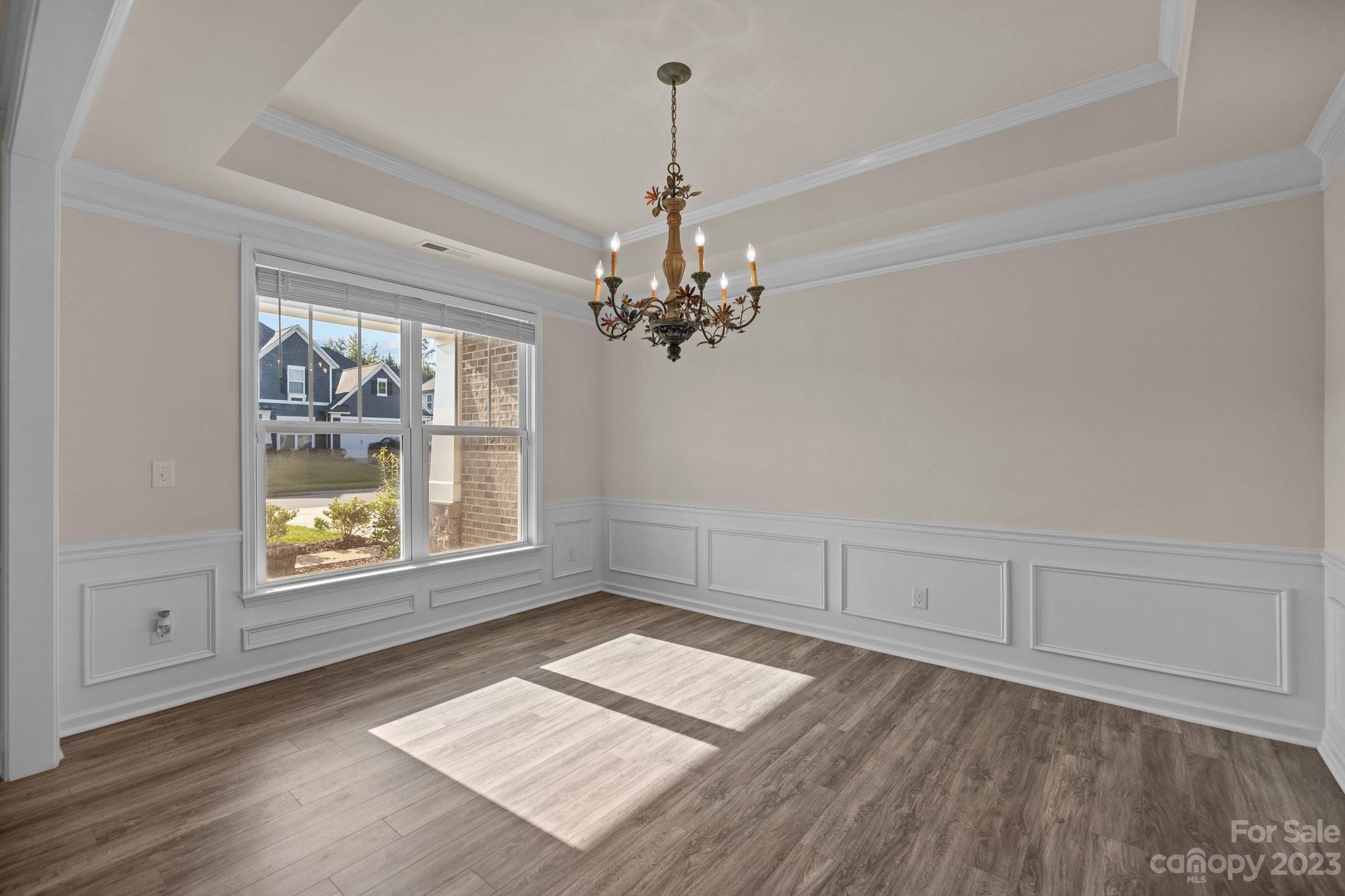 137 Hampton Trail Drive Fort Mill, SC 29708 - Photo 7 of 48 wooden floor in an empty room with a window