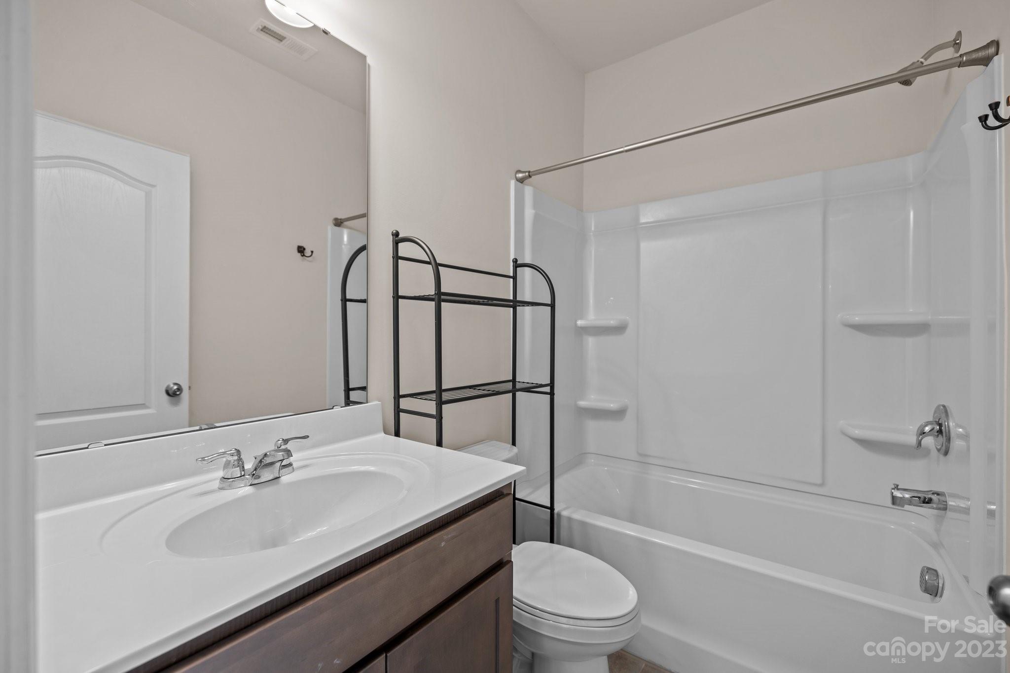 137 Hampton Trail Drive Fort Mill, SC 29708 - Photo 9 of 48 a bathroom with a sink a toilet and shower