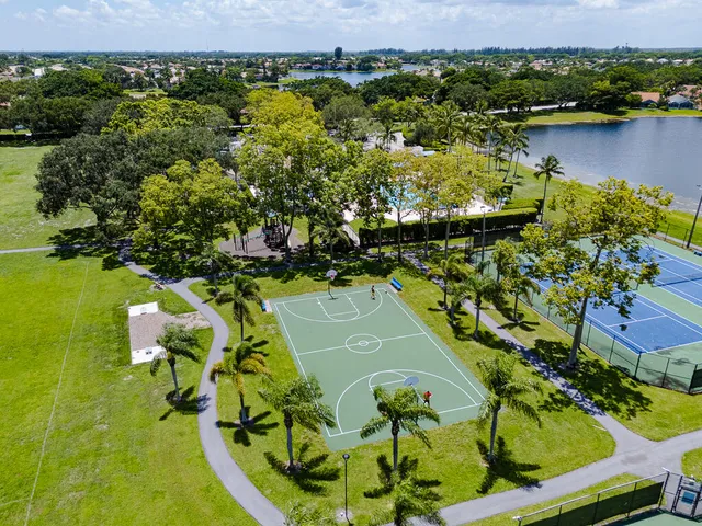 a view of a swimming pool with an outdoor space and seating area
