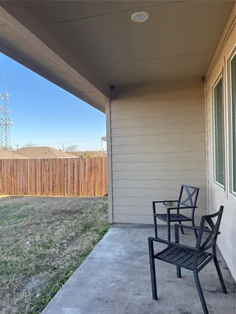 a view of backyard with hardwood