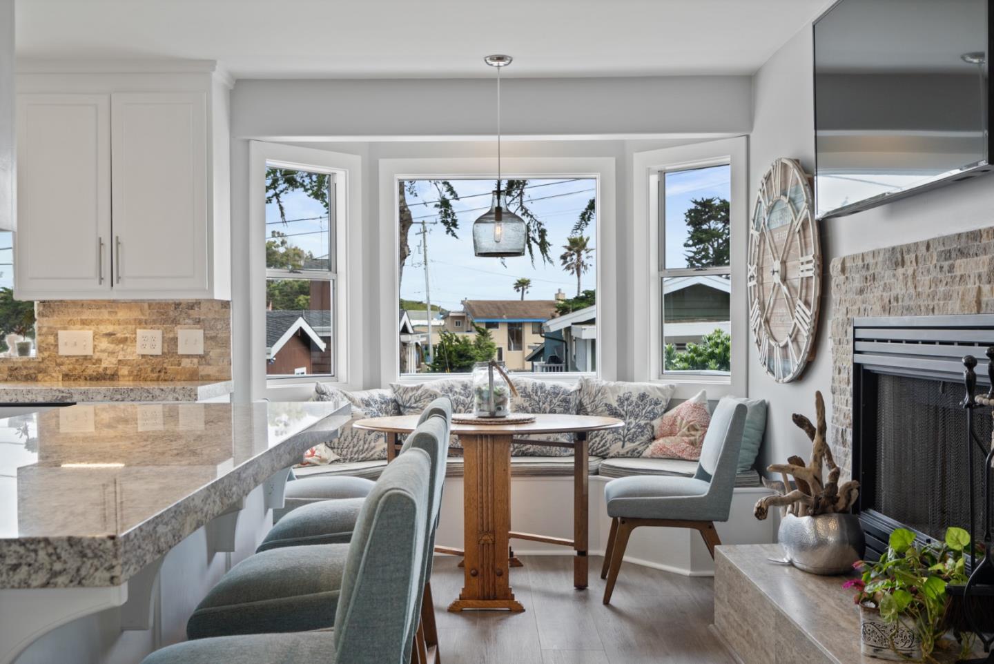 57 Sunset Drive Watsonville, CA 95076 - Photo 12 of 44 a dining room with furniture a fireplace and large windows