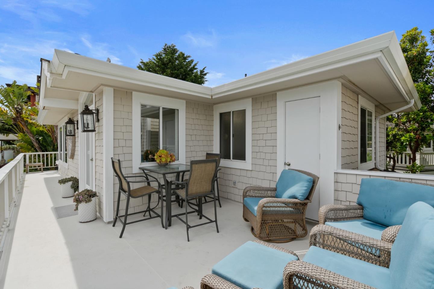 57 Sunset Drive Watsonville, CA 95076 - Photo 18 of 44 a balcony with furniture and potted plants