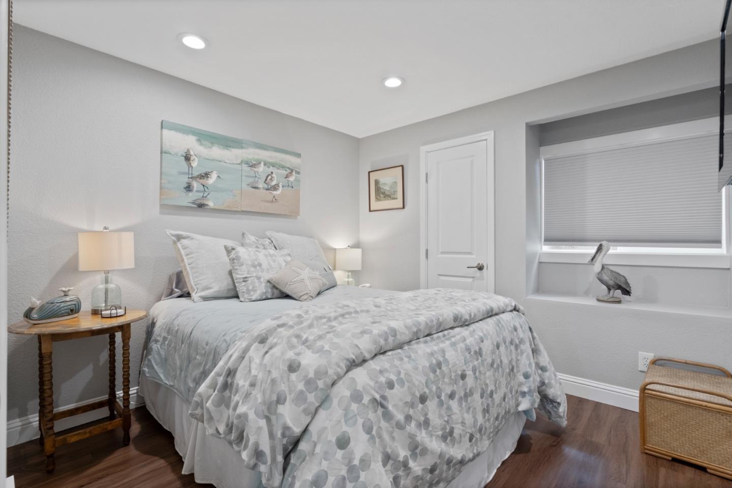 57 Sunset Drive Watsonville, CA 95076 - Photo 22 of 44 a bedroom with a bed and a lamp