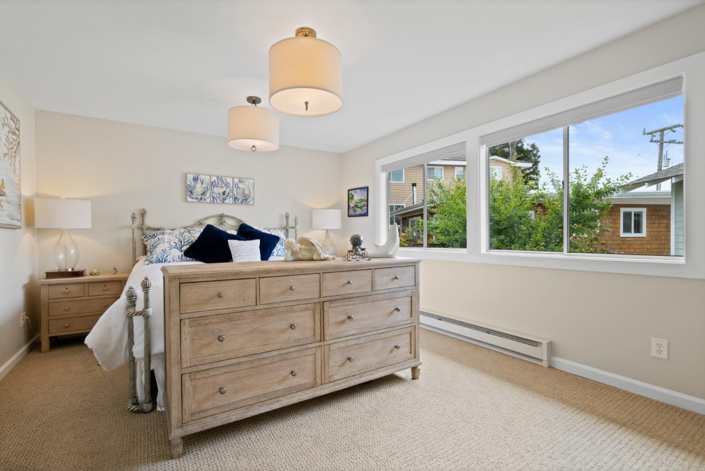 57 Sunset Drive Watsonville, CA 95076 - Photo 25 of 44 a bedroom with a bed and a large window