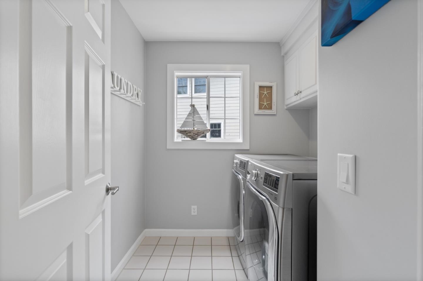 57 Sunset Drive Watsonville, CA 95076 - Photo 29 of 44 a utility room with dryer and washer