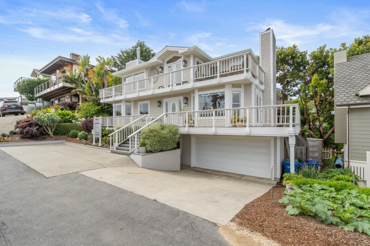 57 Sunset Drive Watsonville, CA 95076 - Photo 4 of 44 a view of a building with a garden