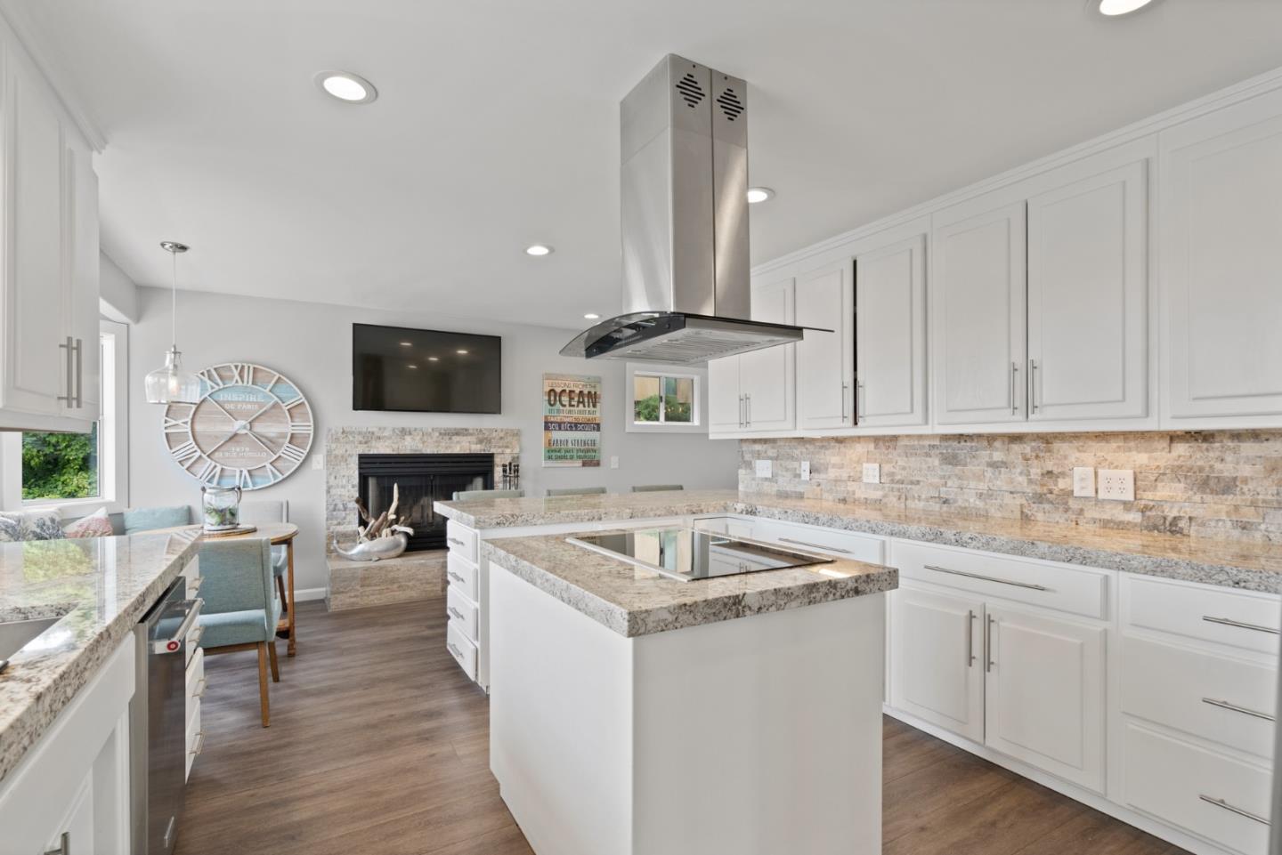 57 Sunset Drive Watsonville, CA 95076 - Photo 9 of 44 a kitchen that has a sink cabinets counter space and appliances