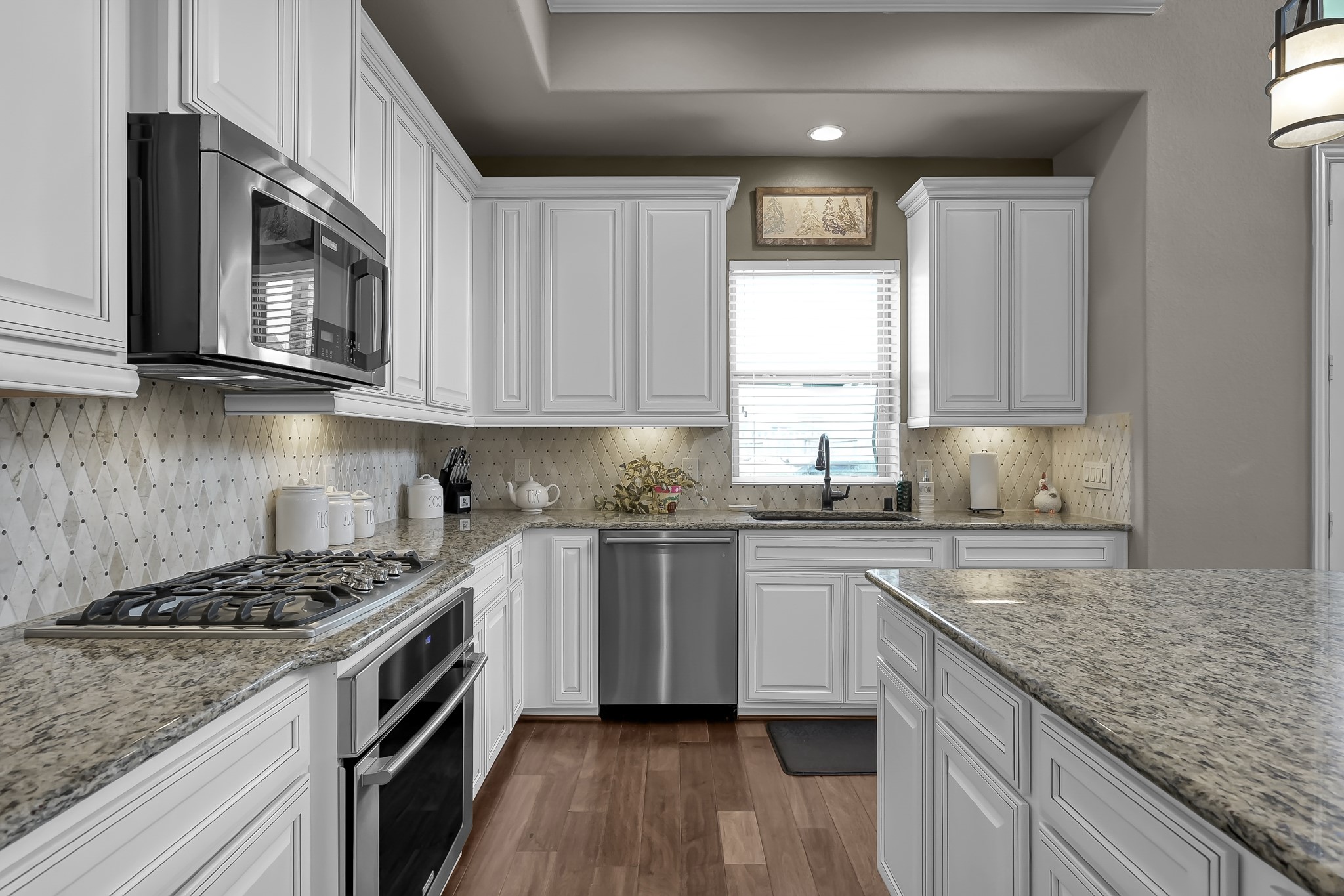 21926 Shamion Court Spring, TX 77379 - Photo 20 of 50 5-burner built-in gas top stove.