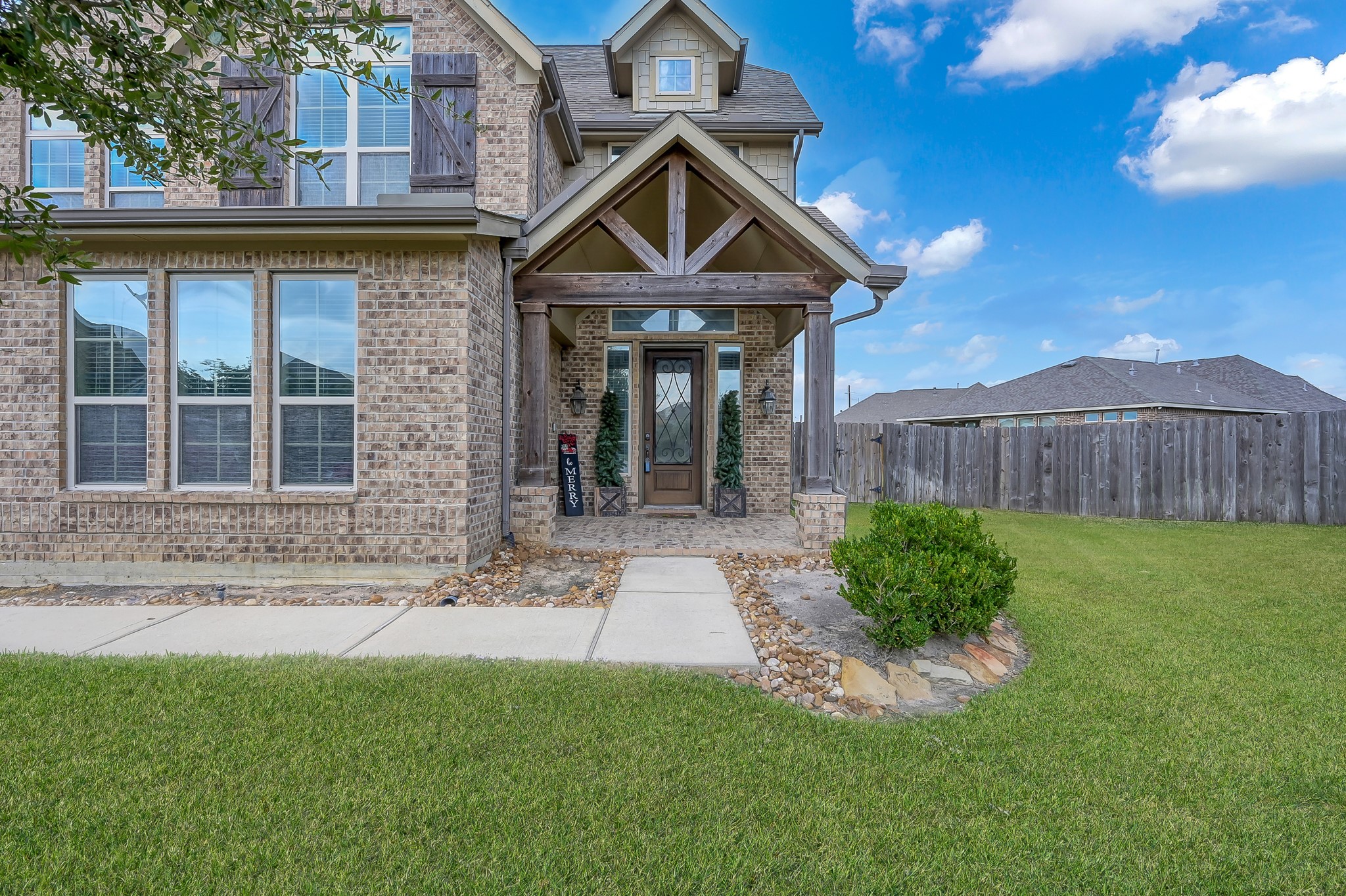 21926 Shamion Court Spring, TX 77379 - Photo 3 of 50 Inviting front porch with iron work door.
