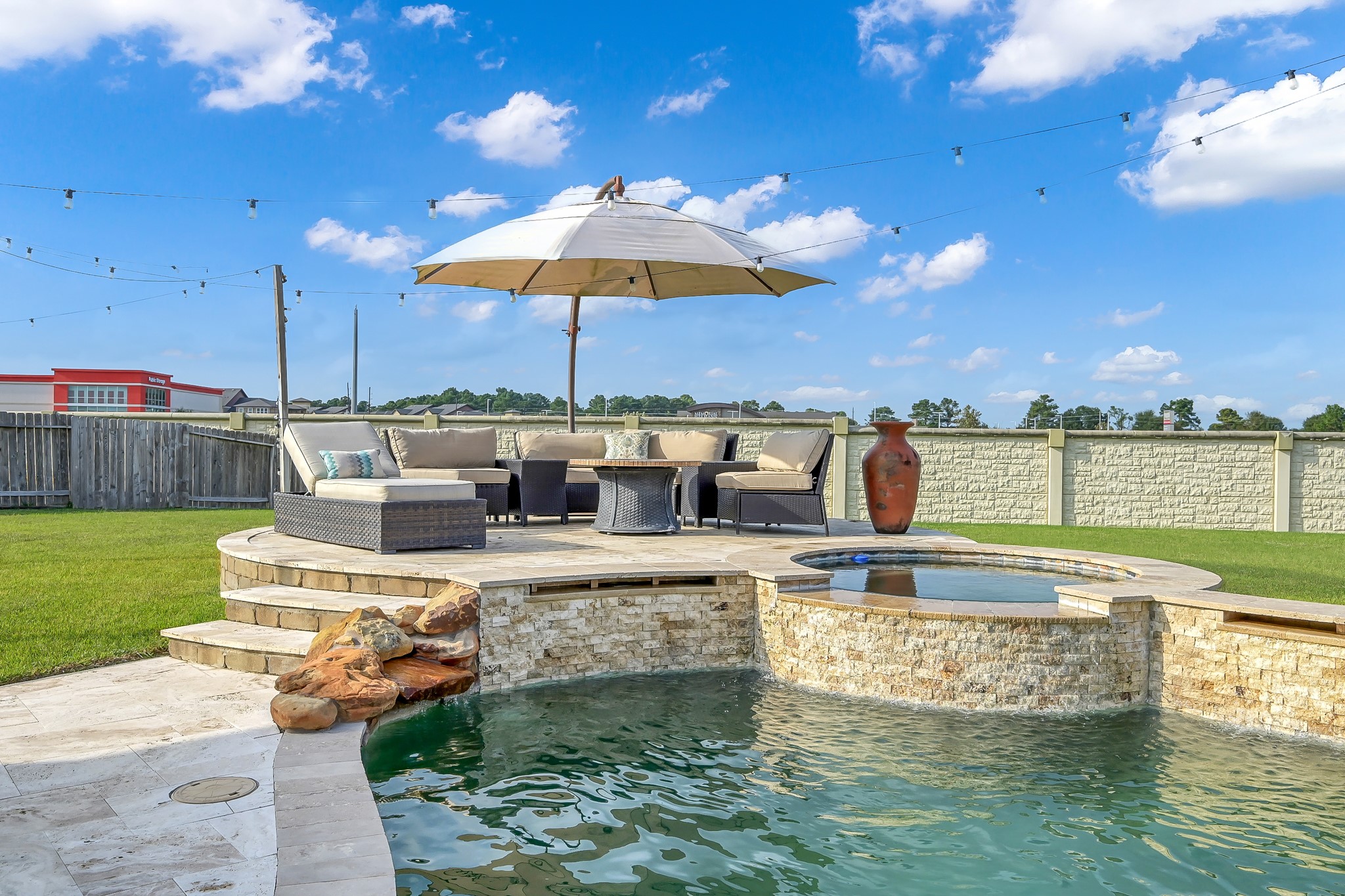 21926 Shamion Court Spring, TX 77379 - Photo 43 of 50 Elevated decking is attached to the hot tub and deep end for diving.