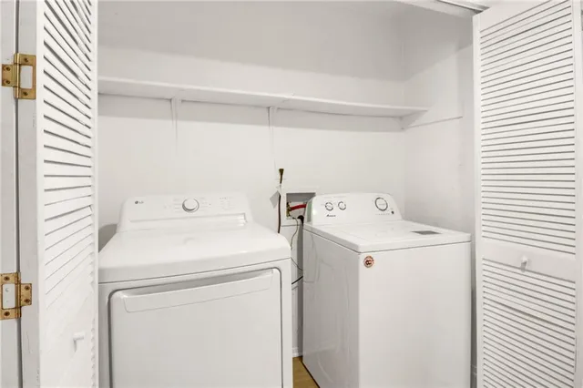 a utility room with dryer and washer