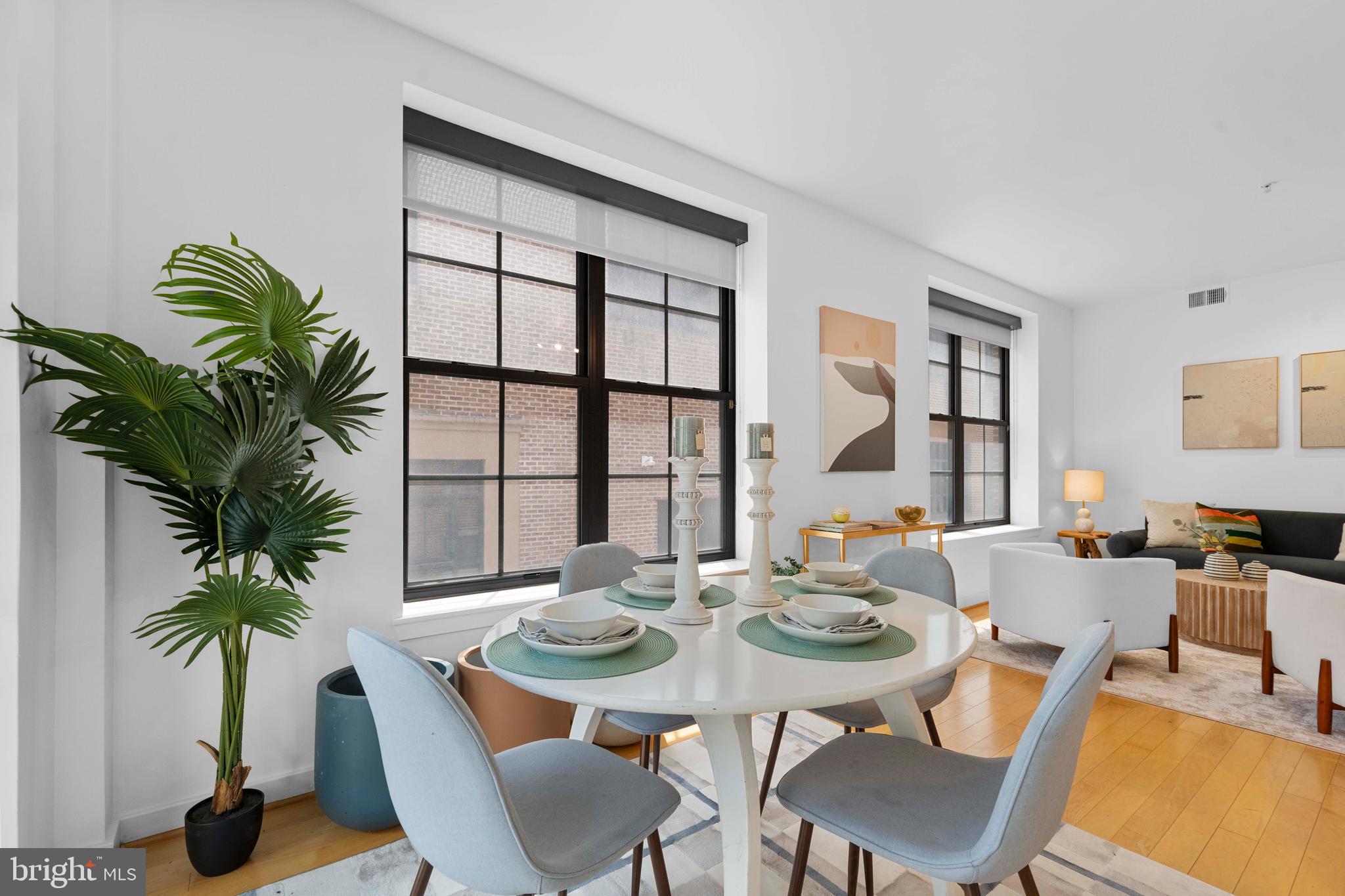 2412 17th Street Northwest, Unit 102 Washington, DC 20009 - Photo 9 of 21 a view of a dining room with furniture and window