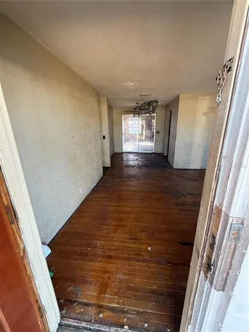 a view of an empty room and window