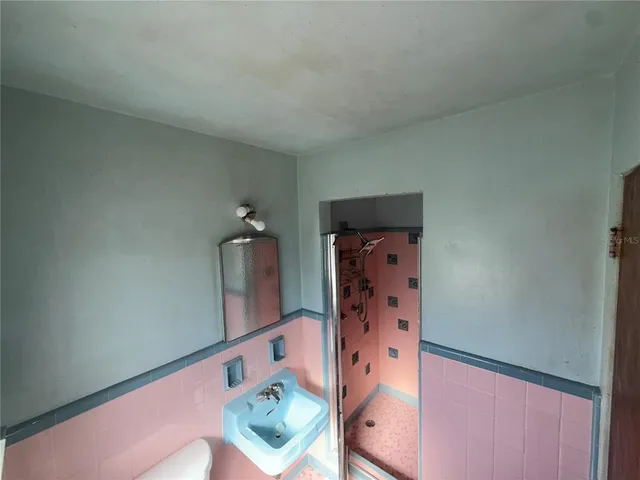 view of a livingroom with a refrigerator