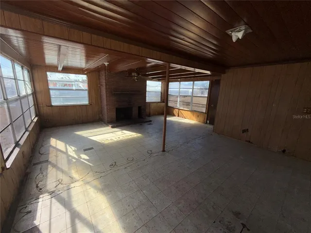 a view of an empty room with window