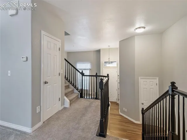 a view of a livingroom from a hallway