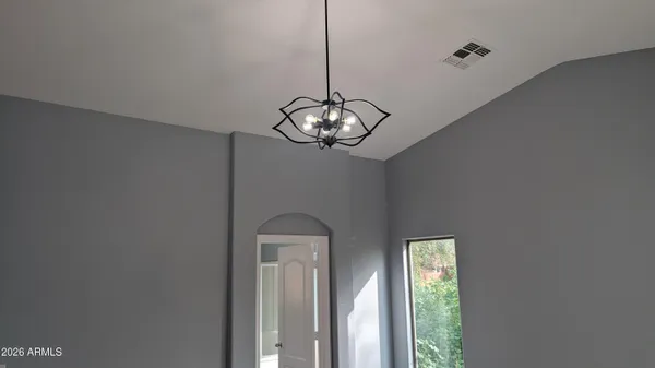 a vase of flowers sitting on a table