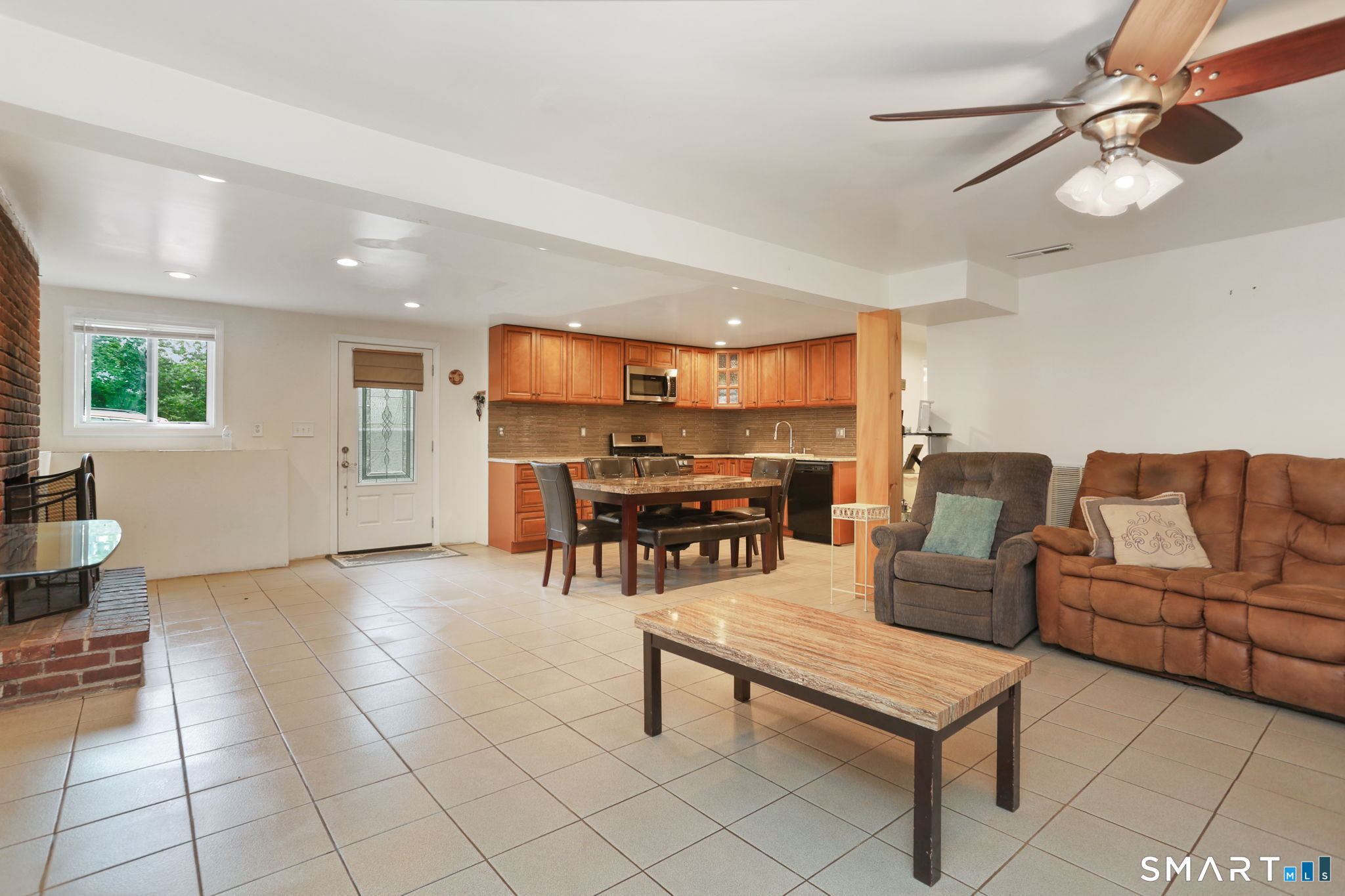 421 Strong Street East Haven, CT 06512 - Photo 22 of 30 a living room with furniture and kitchen view