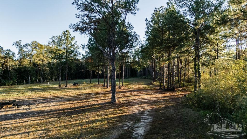 4875 Greenwood Road Jay, FL 32565 - Photo 11 of 28 a view of a basketball court