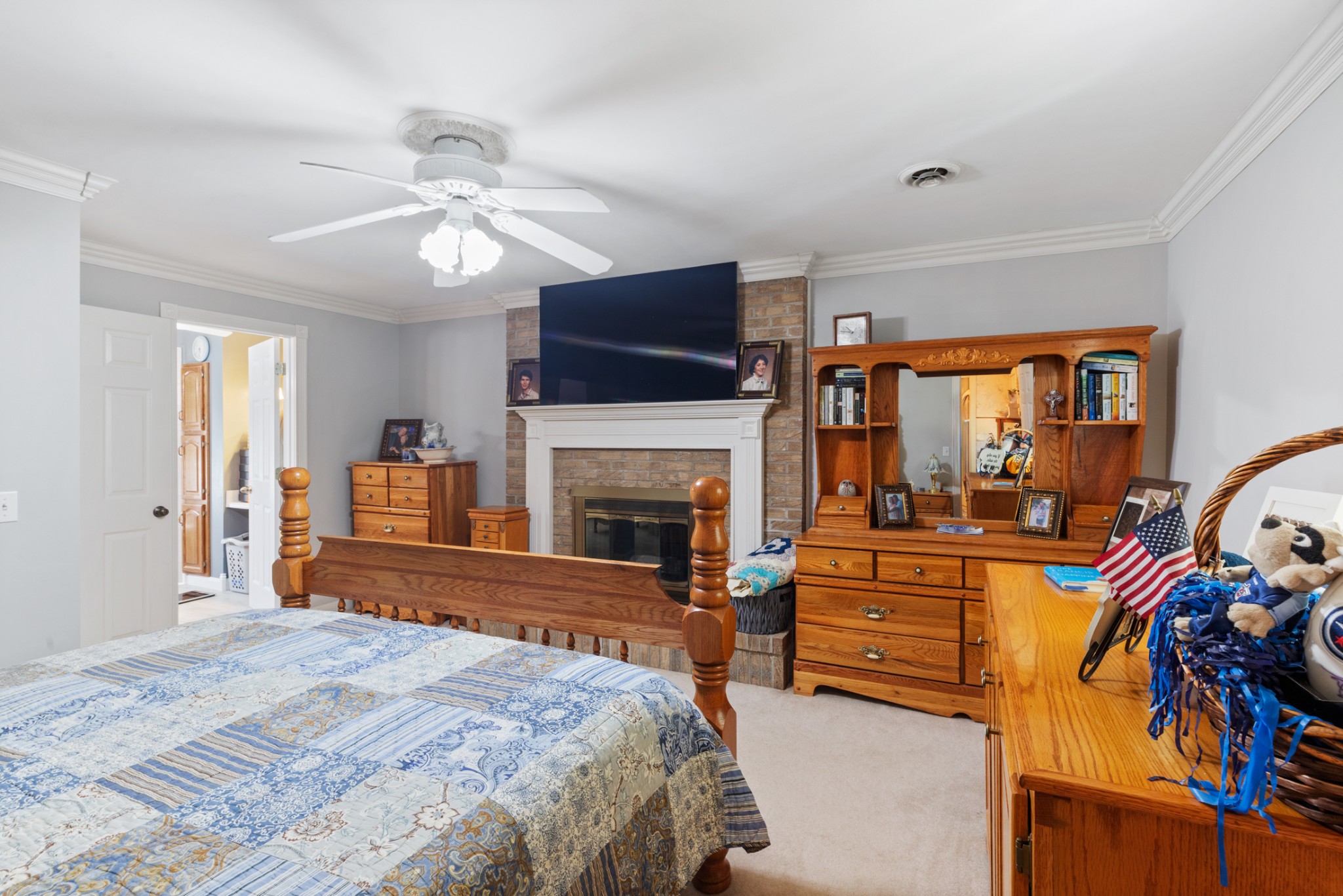 7422 Indian Creek Road McEwen, TN 37101 - Photo 47 of 71 a bedroom with a bed and a flat screen tv