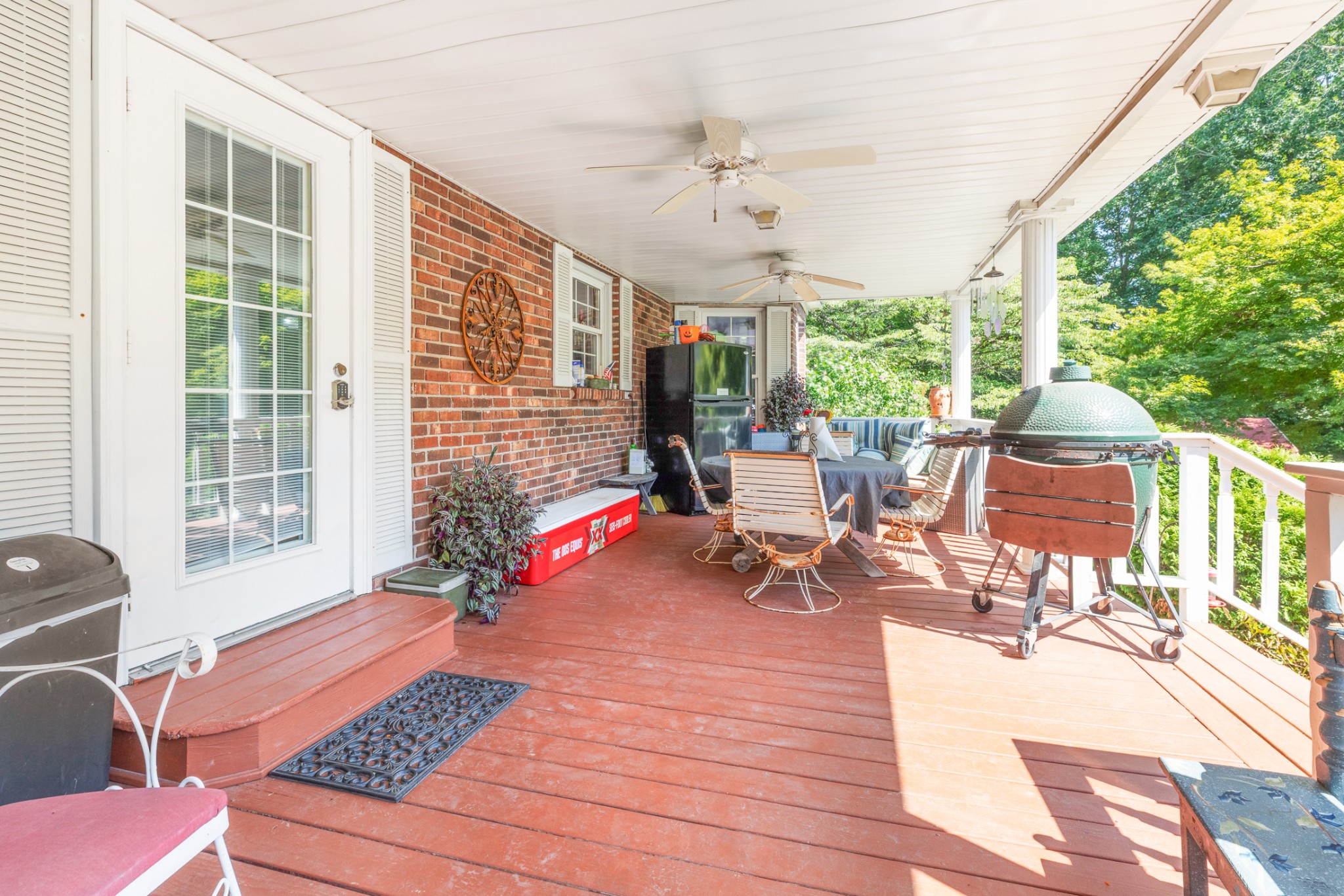 7422 Indian Creek Road McEwen, TN 37101 - Photo 60 of 71 a living room filled with furniture hardwood floor and a floor to ceiling window
