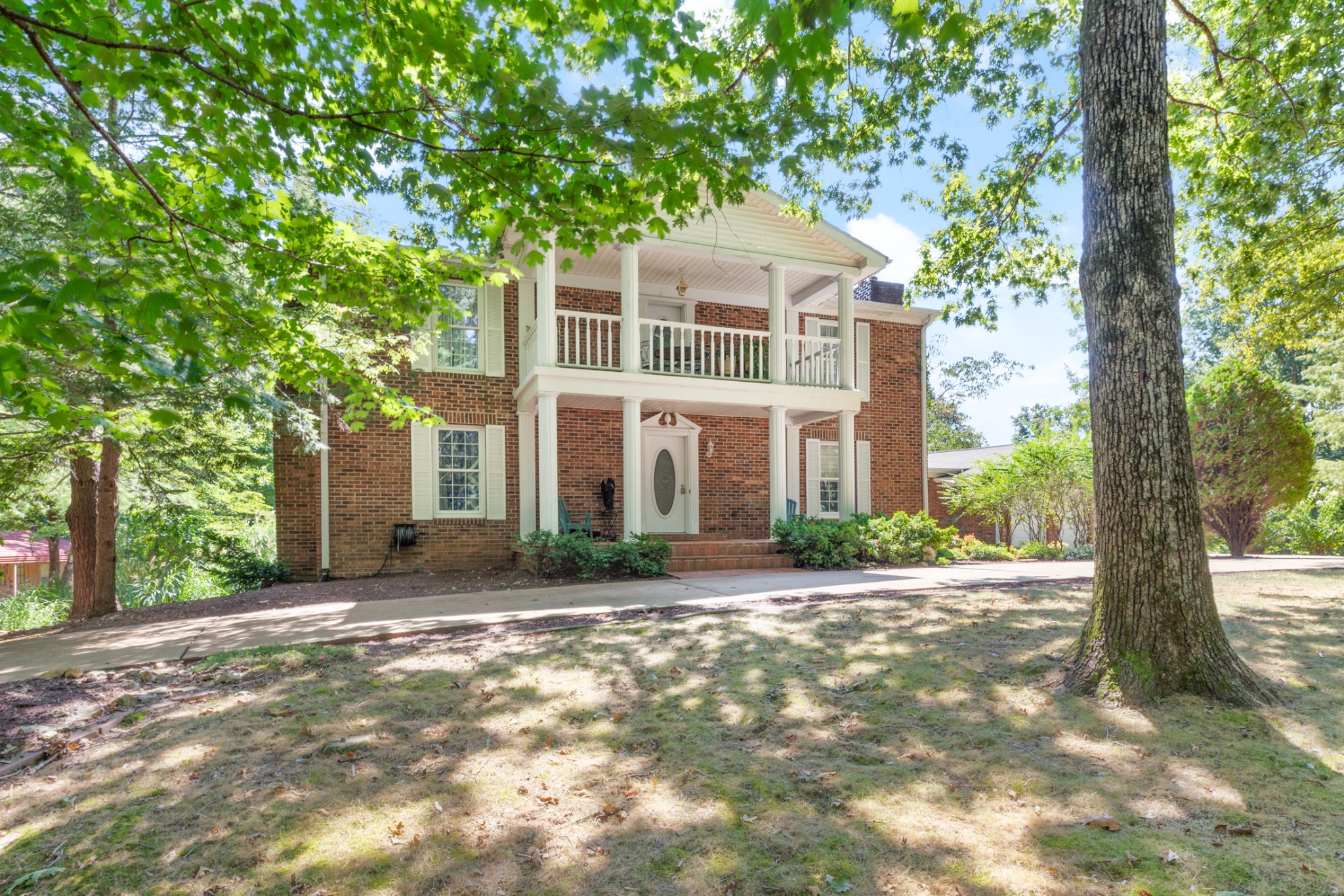 7422 Indian Creek Road McEwen, TN 37101 - Photo 6 of 71 a front view of a house with a yard and trees