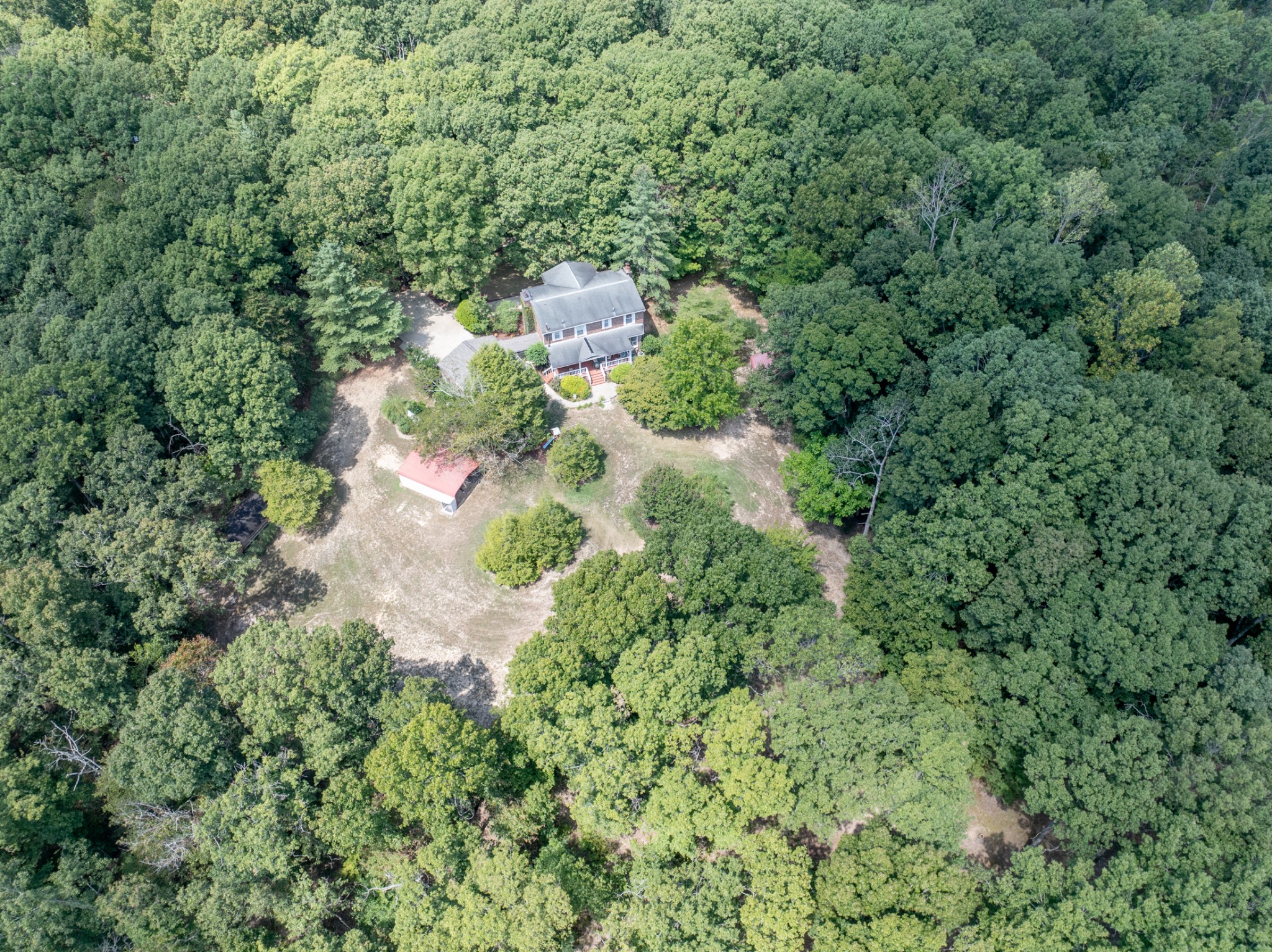 7422 Indian Creek Road McEwen, TN 37101 - Photo 71 of 71 an aerial view of residential house with outdoor space and trees all around