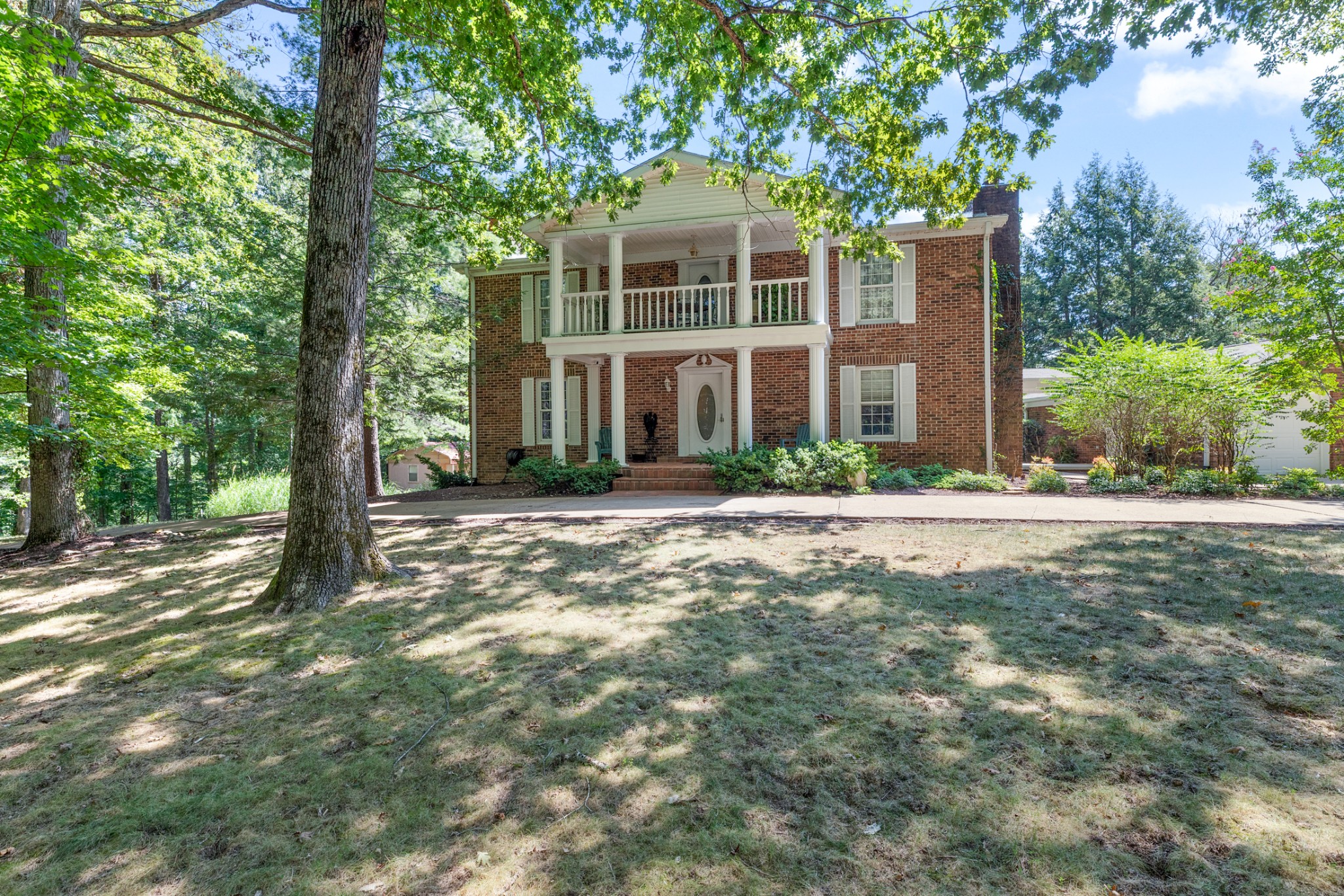 7422 Indian Creek Road McEwen, TN 37101 - Photo 8 of 71 a front view of a house with garden