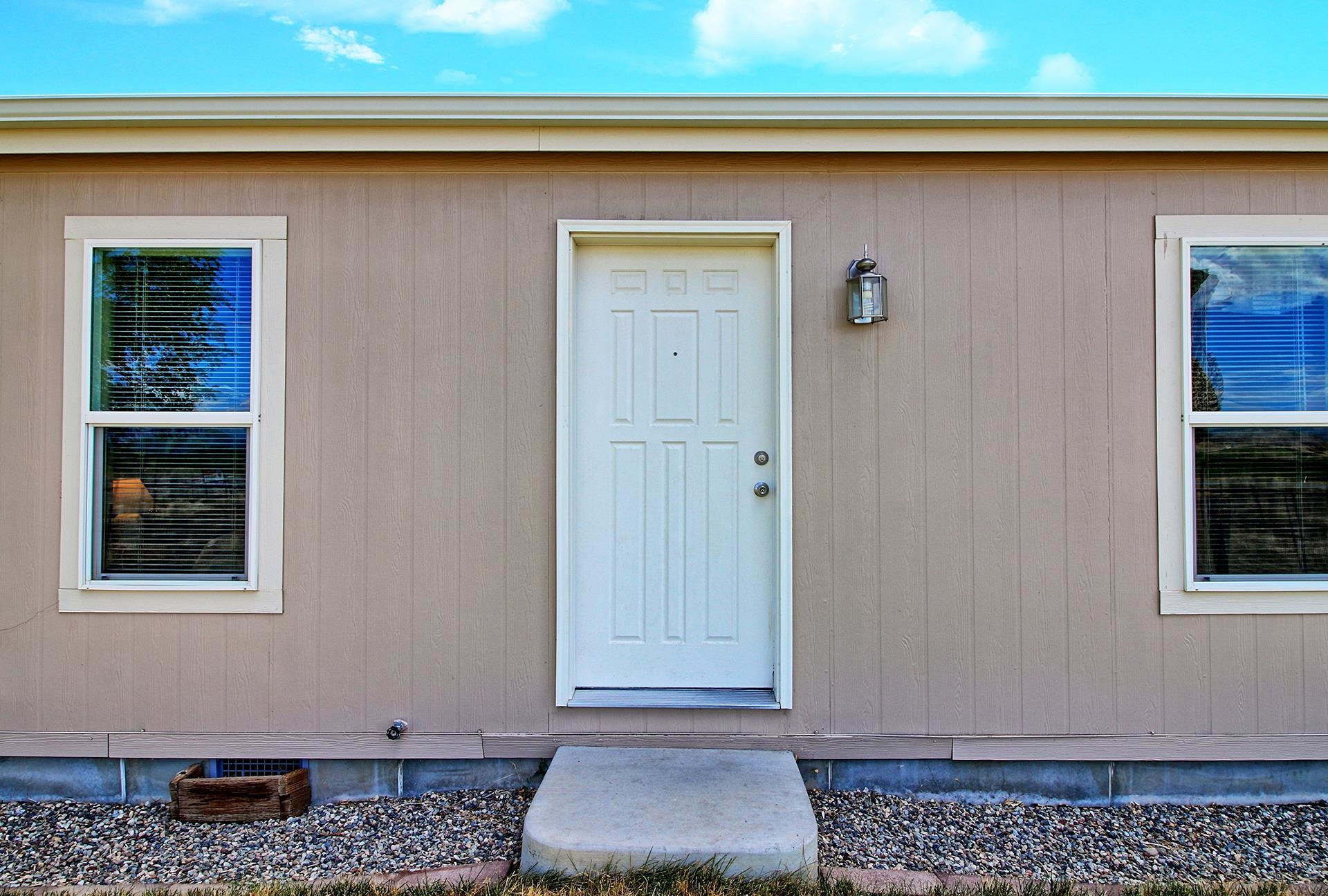 1548 18 Road Fruita, CO 81521 - Photo 10 of 34 a front view of a house