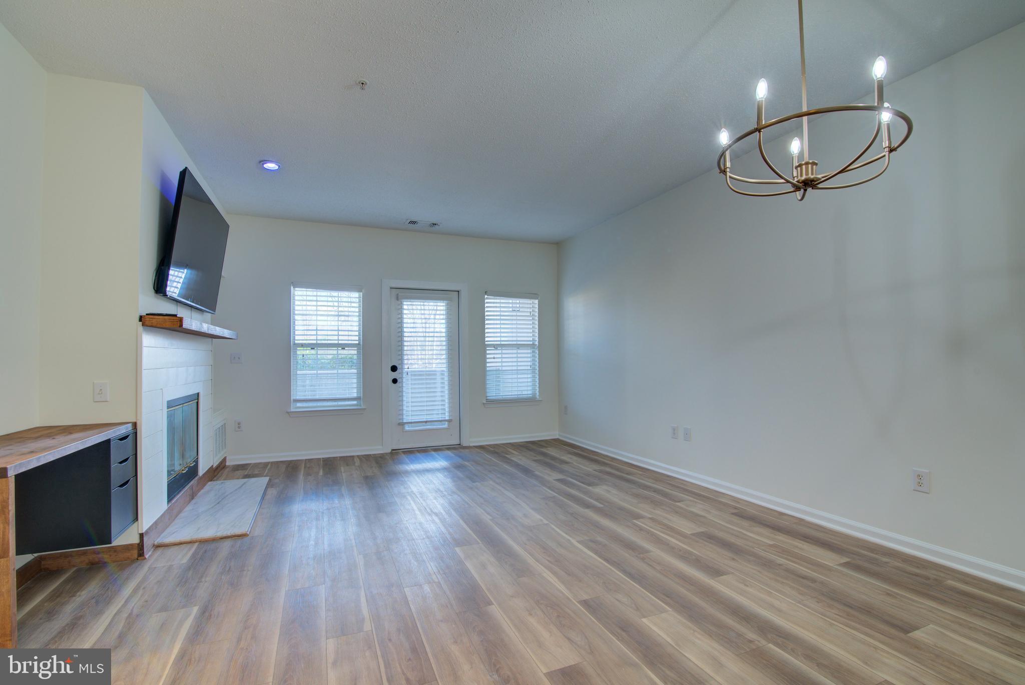 1708 Lake Shore Crest Drive Reston, VA 20190 - Photo 14 of 25 Dining and living room space