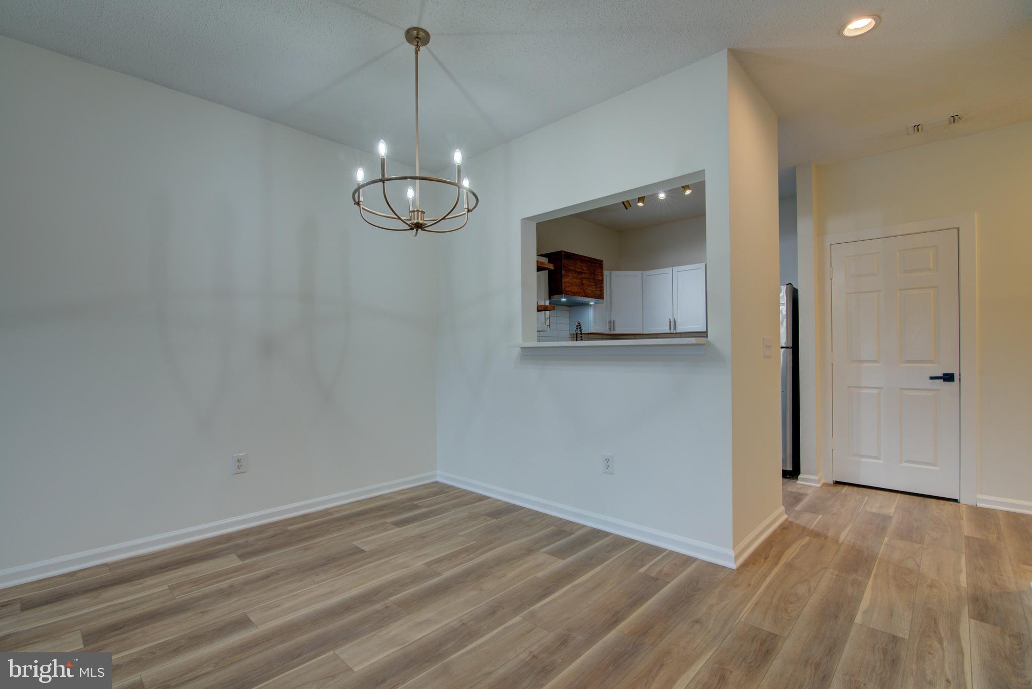 1708 Lake Shore Crest Drive Reston, VA 20190 - Photo 18 of 25 Dinning area with stylish light fixture