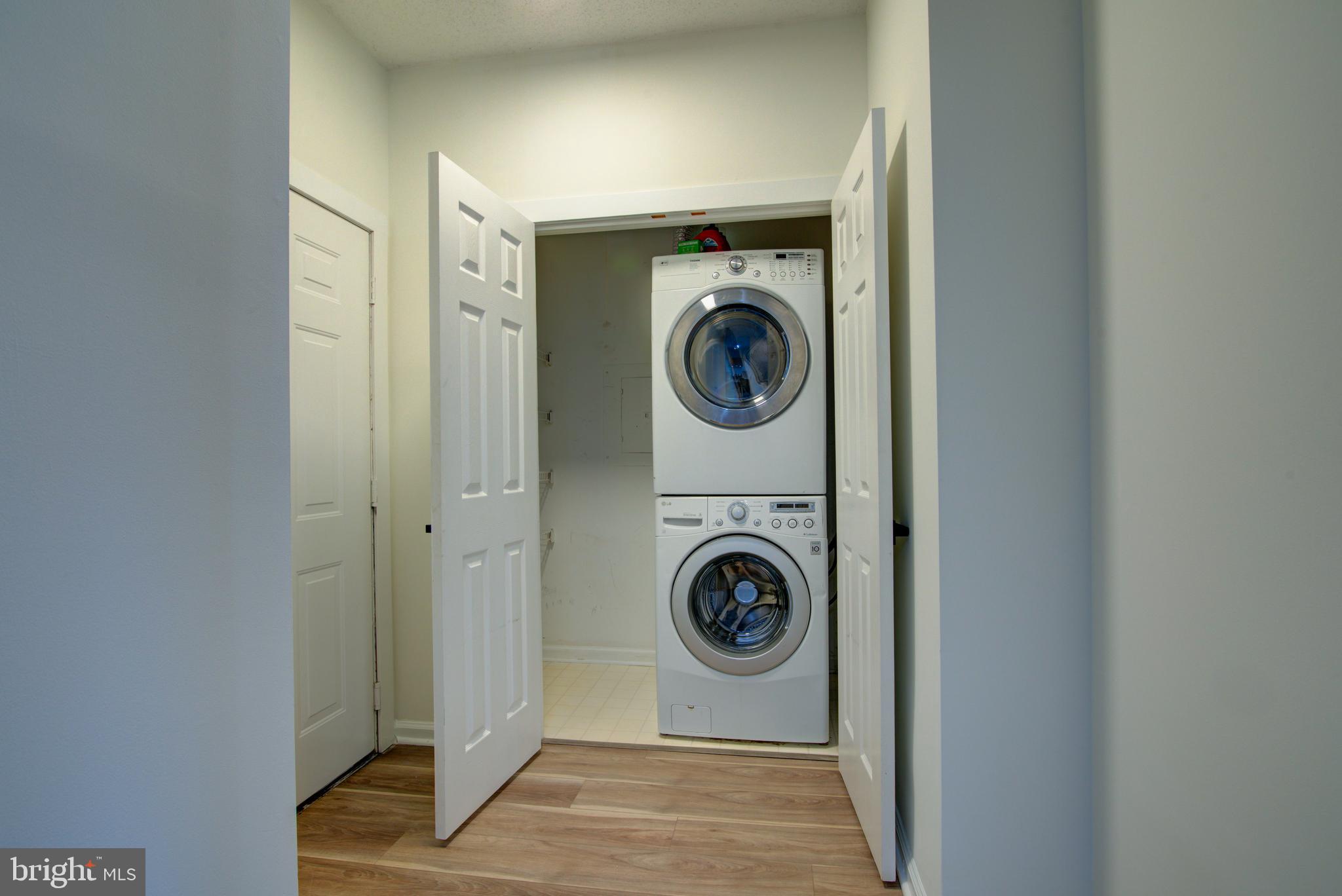 1708 Lake Shore Crest Drive Reston, VA 20190 - Photo 21 of 25 Stacked washer and dryer with storage