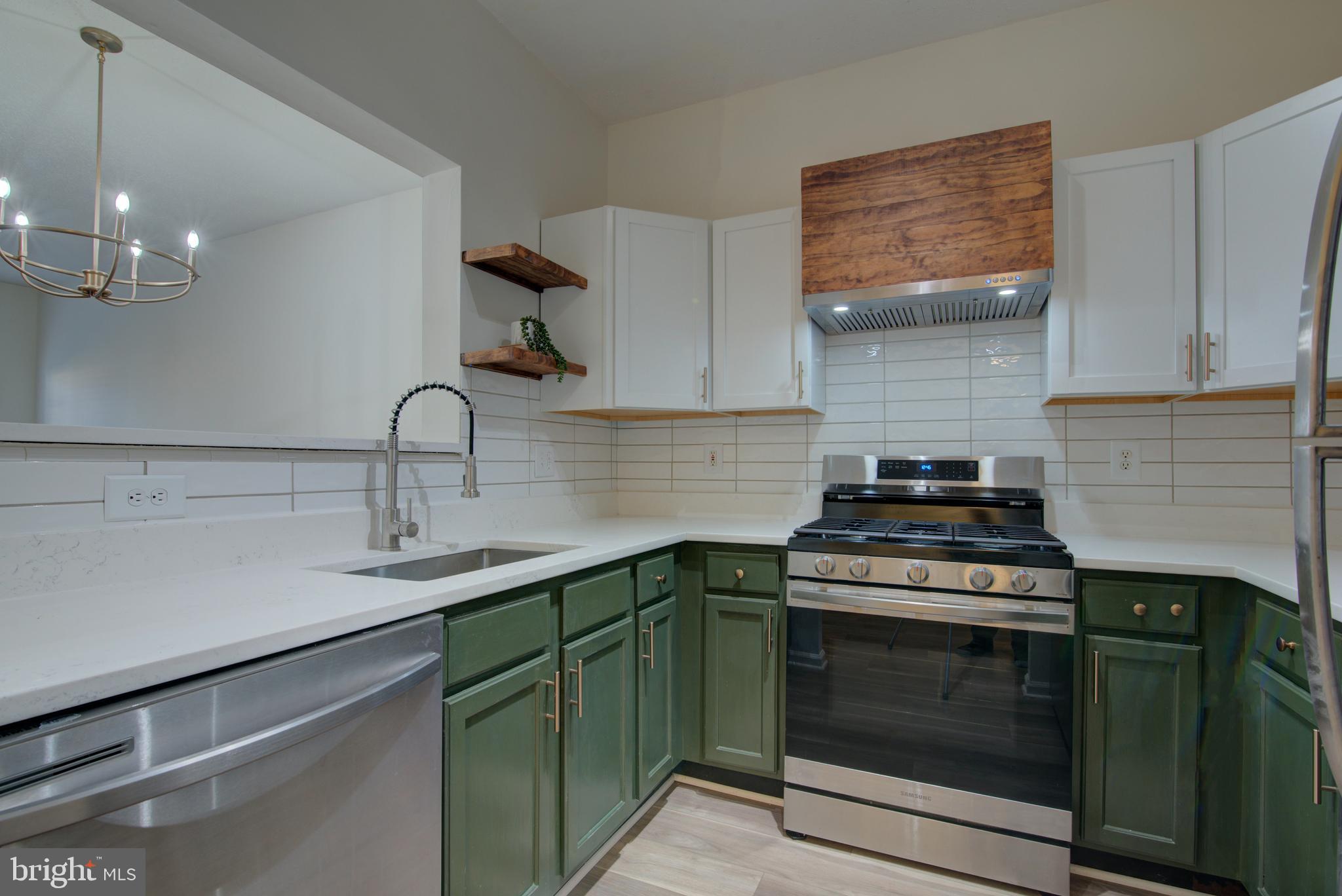 1708 Lake Shore Crest Drive Reston, VA 20190 - Photo 3 of 25 Updated kitchen with quartz counter tops