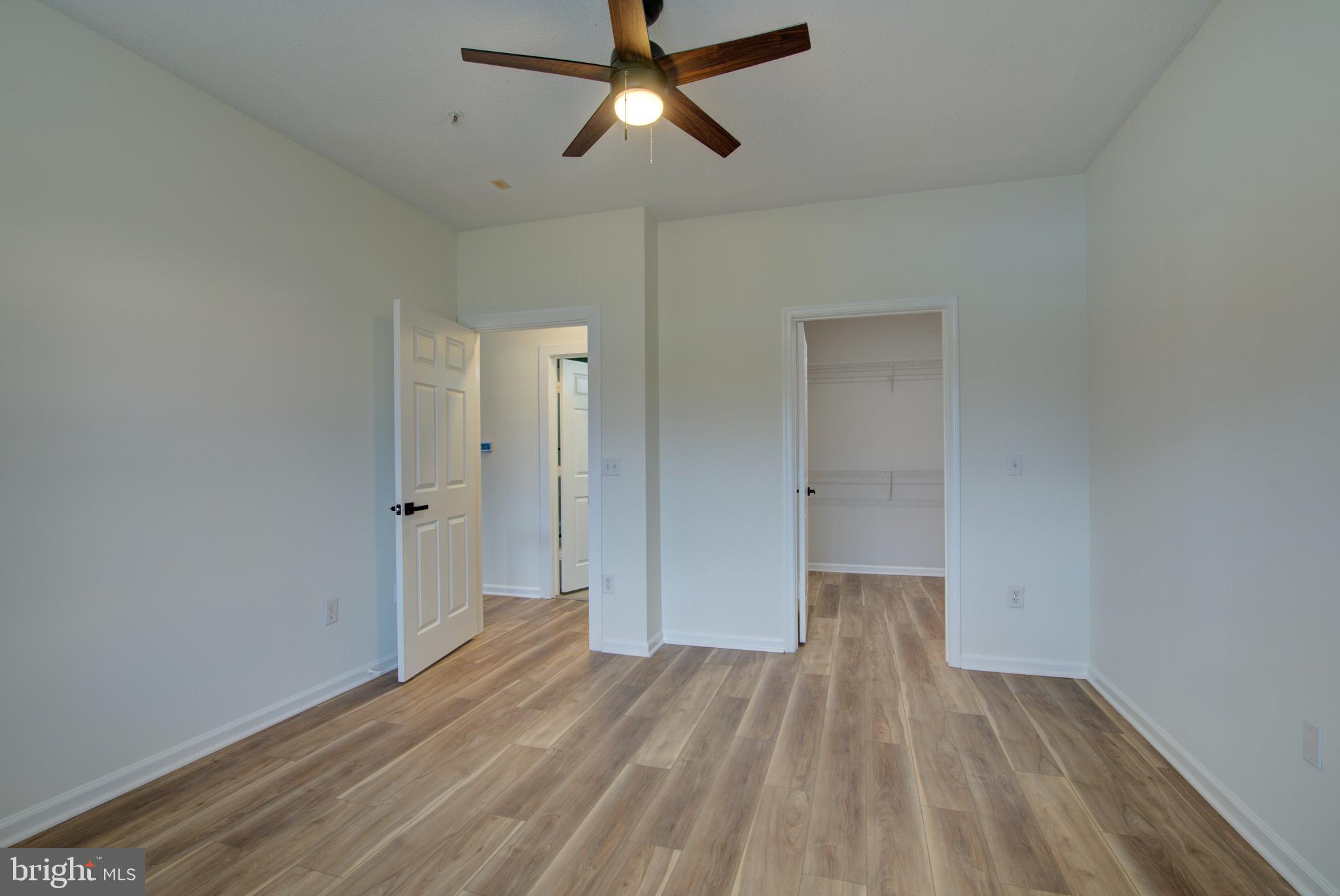 1708 Lake Shore Crest Drive Reston, VA 20190 - Photo 8 of 25 Large primary bedroom with LVP