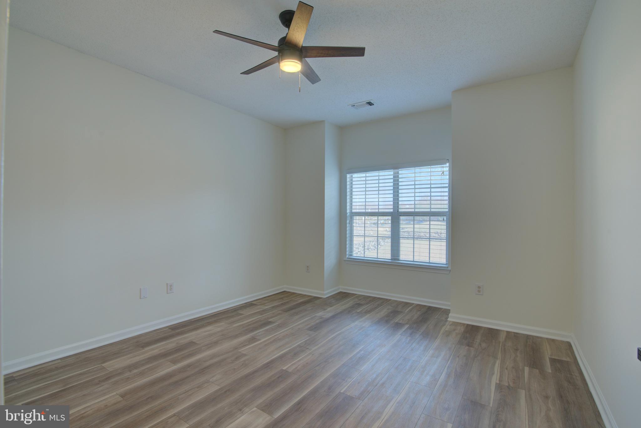 1708 Lake Shore Crest Drive Reston, VA 20190 - Photo 9 of 25 Ceiling fan in primary bedroom