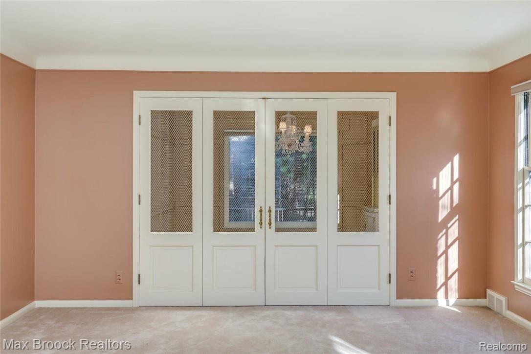 19500 Canterbury Road Detroit, MI 48221 - Photo 7 of 37 French doors between formal living and dining rooms